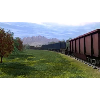 A train carrying cargo containers travels down the tracks.