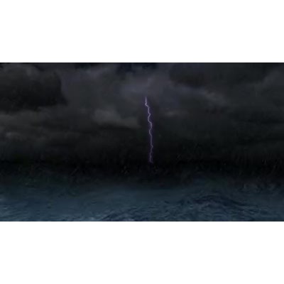 This video shows big ocean waves with rain and lightening overhead.