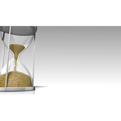 This video shows an hourglass with sand passing through.