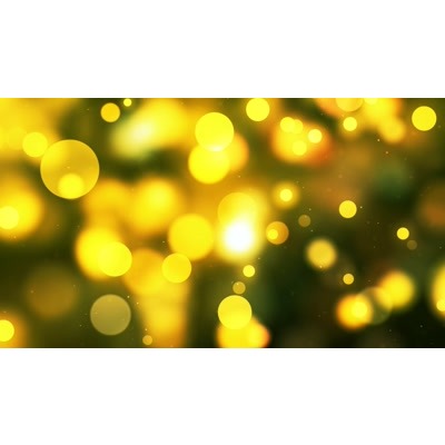 Golden particles twist and flow out of focus in this scene.