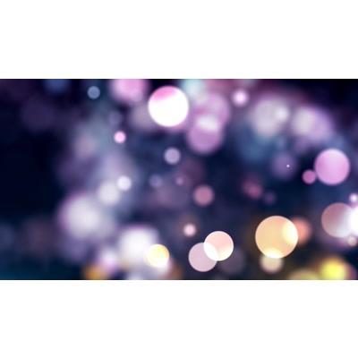 Multicolored out of focus dots rotating and spinning.