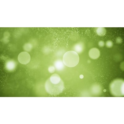 Spheres randomly float across a green background.