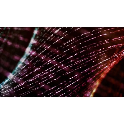 A twisting spiral of vibrant color shining on a dark background.