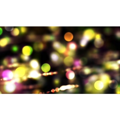 Multicolored dots undulated in and out of focus in this abstract video.