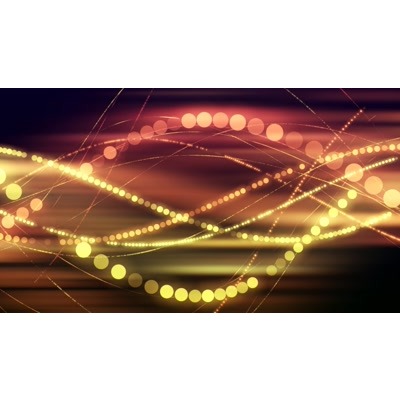 Flowing beads of light across a dark background.