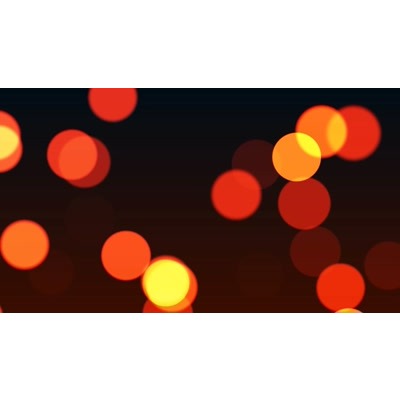 Particles float gently over a surface.