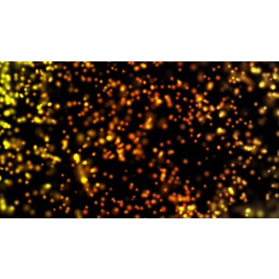 An array of golden particles floating across a background.