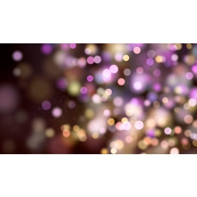 Purple particles floating around a blurry background.