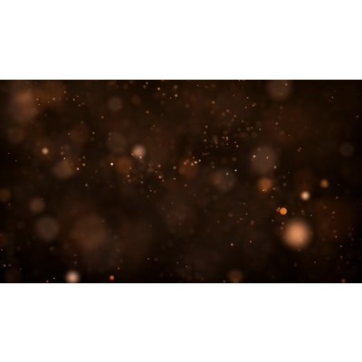 Particles scatter across this abstract video.
