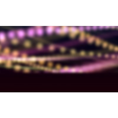 Colorful beads out of focus flowing across this abstract video.