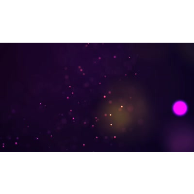 Particles dance and glow about this abstract video background.