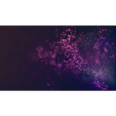 Sparkling particles dot this video background.