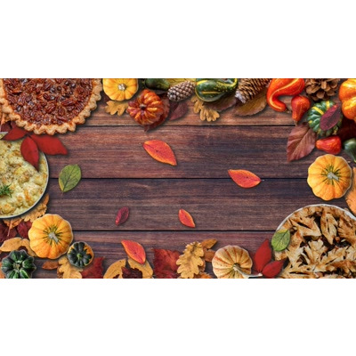 A wooden table top is the setting for this festive autumn video background featuring fresh pies and gourds.