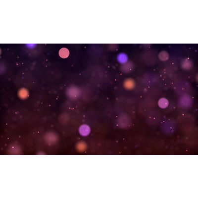 Particles dance and glow about this abstract video background.