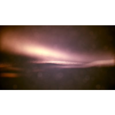 Brilliant beams of light on abstract video.