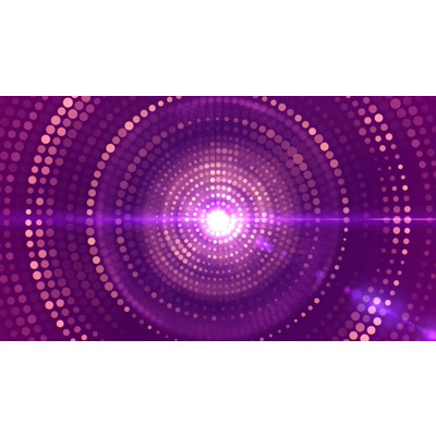 Glowing particles rotate around this video background.