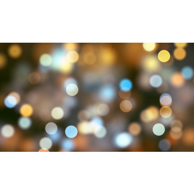 An array of particles floating across this abstract video.