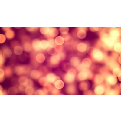 An array of particles floating across this abstract video.