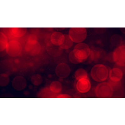 Red particles floating around this abstract video.