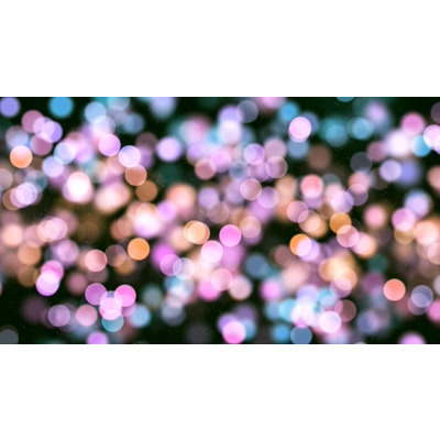 An array of particles flowing across this abstract video.