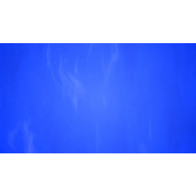 Colorful blue sky with particles floating across this abstract video.