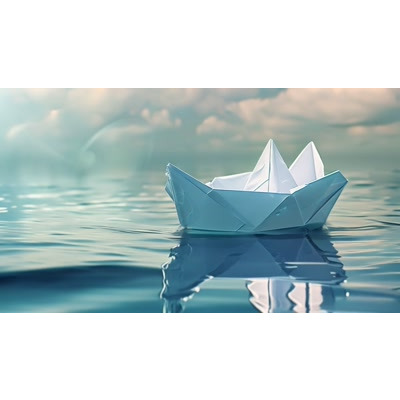 Download this image of a paper boat to symbolize dreams, hope, and navigating life&#039;s challenges with grace and adaptability.