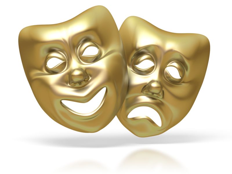 Tragic And Comedic Masks On Red Velvet Stock Photo - Download